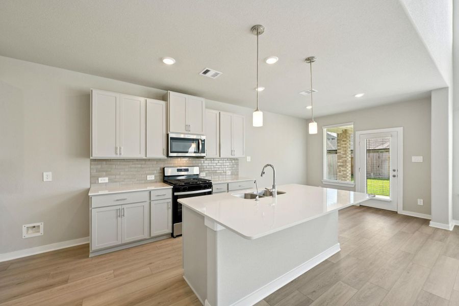 Photo is not of the actual home, but is an inspirational photo of builder’s model home and may depict options, furnishings, and/or decorator features that are not included