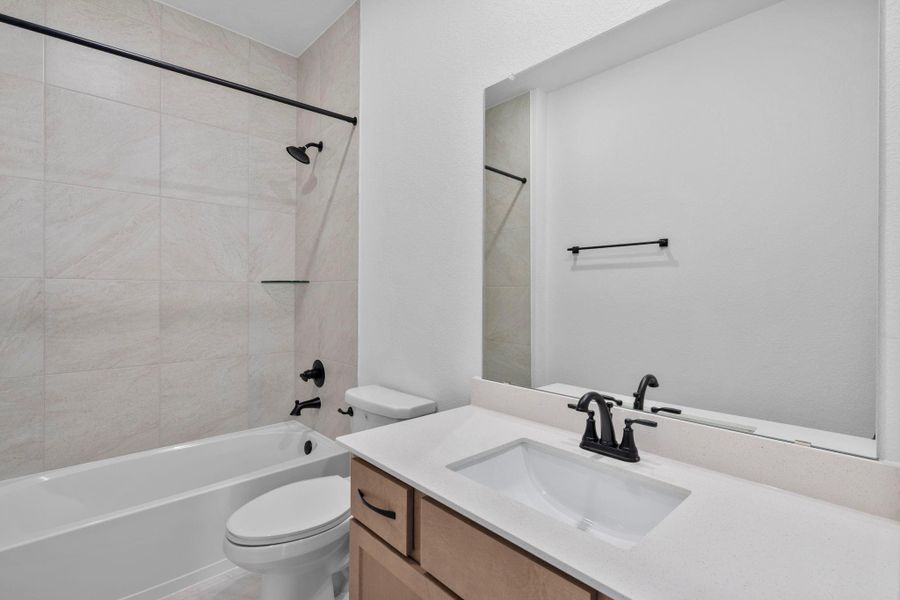 Furnished interior view inside a new home in Elyson, Katy (Image 11).