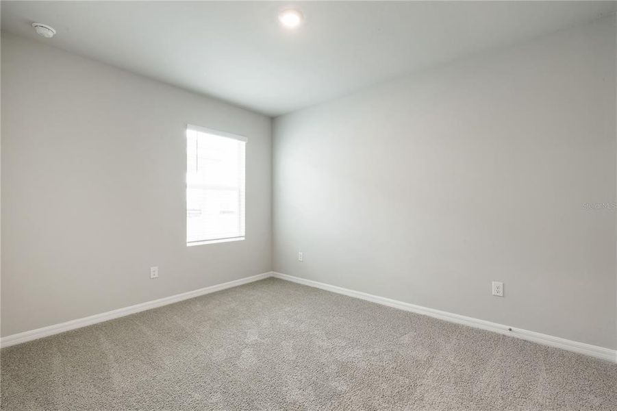 Spacious, unfurnished interior of a new home in Coral Lakes - Tradition & Express, Punta Gorda (Image 17). Spacious, unfurnished interior of a new home in Coral Lakes - Tradition & Express, Punta Gorda (Image 17).