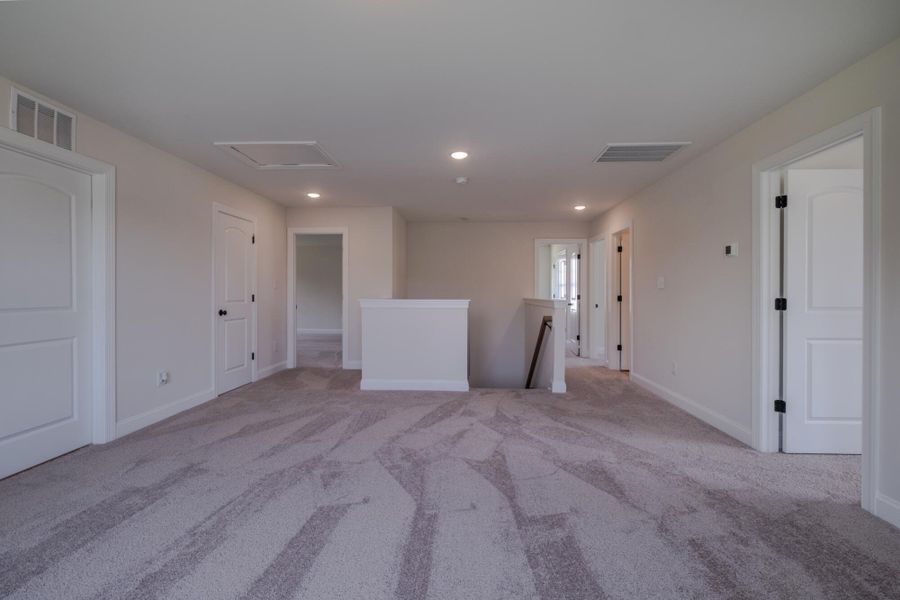 Spacious, unfurnished interior of a new home in Cottages at Piper Village, Trinity (Image 27). Spacious, unfurnished interior of a new home in Cottages at Piper Village, Trinity (Image 27).