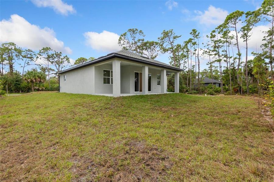 Exterior details and patio area of a home in , Port Charlotte (Image 3).