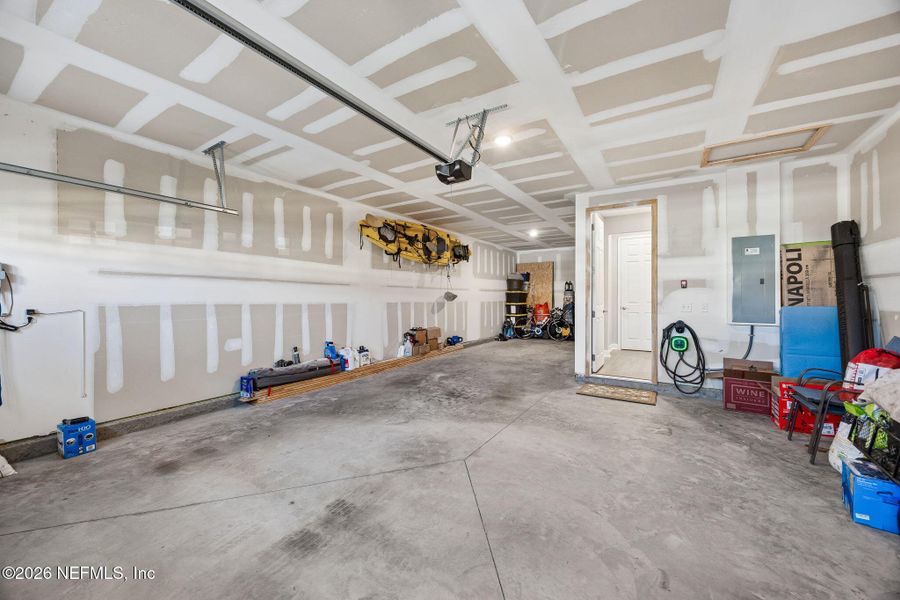 In-progress construction of a new home in Tributary, Yulee, FL (Image 40).