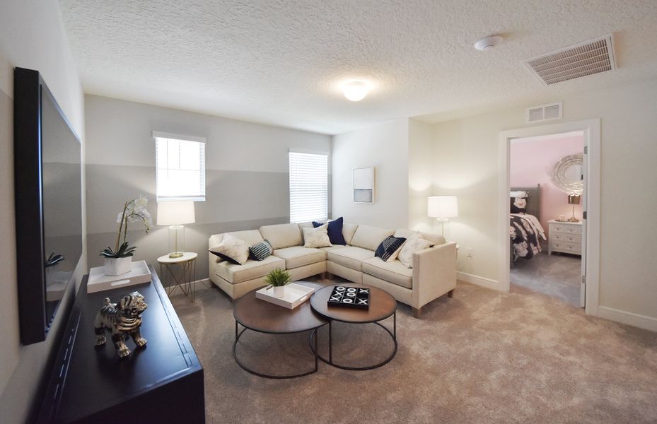 Furnished interior view inside a new home in Caloosa Cove, Labelle (Image 6).