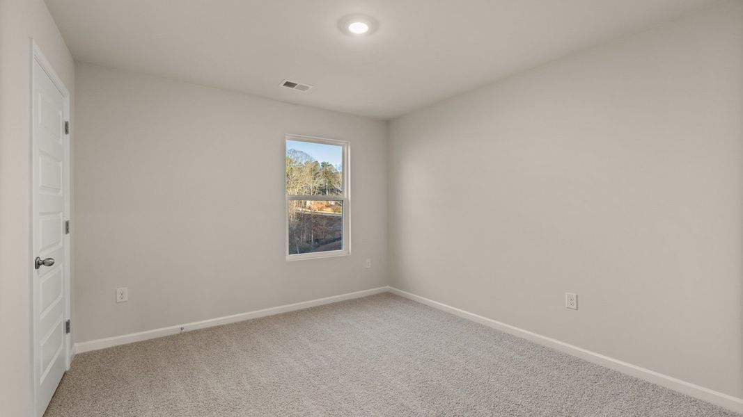 Representative unfurnished interior of a home built from the Hayden by D.R. Horton in Brooks Station, Dacula (Image 23).
