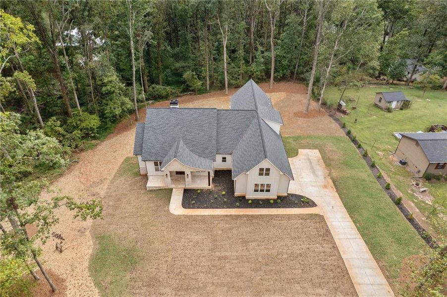 Front exterior of a new home in , Canton, GA, highlighting curb appeal (Image 30).