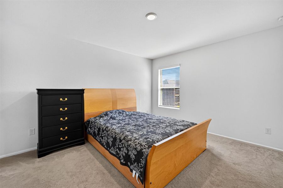 Furnished interior view inside a new home in Sunterra: Watermill Collection, Katy (Image 8).