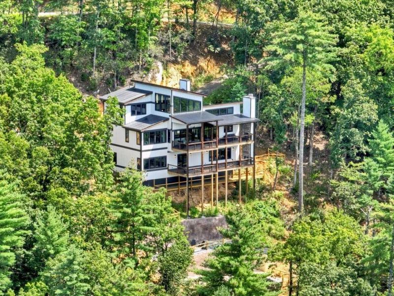 Front exterior of a new home in , Epworth, GA, highlighting curb appeal (Image 30).