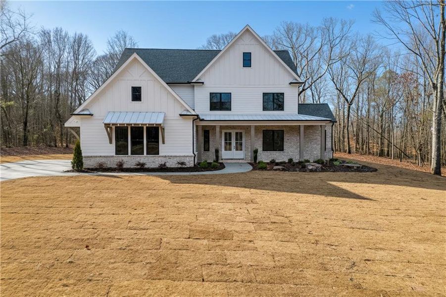 Front exterior of a new home in , Pendergrass, GA, highlighting curb appeal (Image 9). Front exterior of a new home in , Pendergrass, GA, highlighting curb appeal (Image 9).
