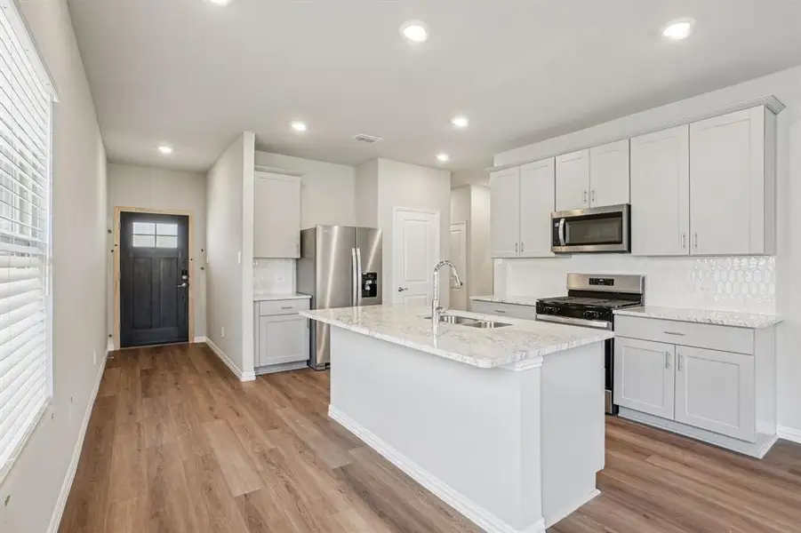 Photo is not of the actual home, but is an inspirational photo of builder’s model home and may depict options, furnishings, and/or decorator features that are not included.