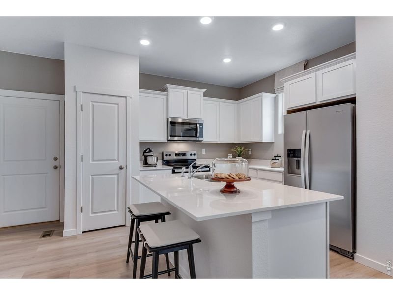 Furnished interior view inside a new home in Vista Meadows, Fort Lupton (Image 12).