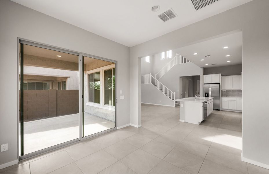 Spacious, unfurnished interior of a new home in Legado West, Queen Creek (Image 27).