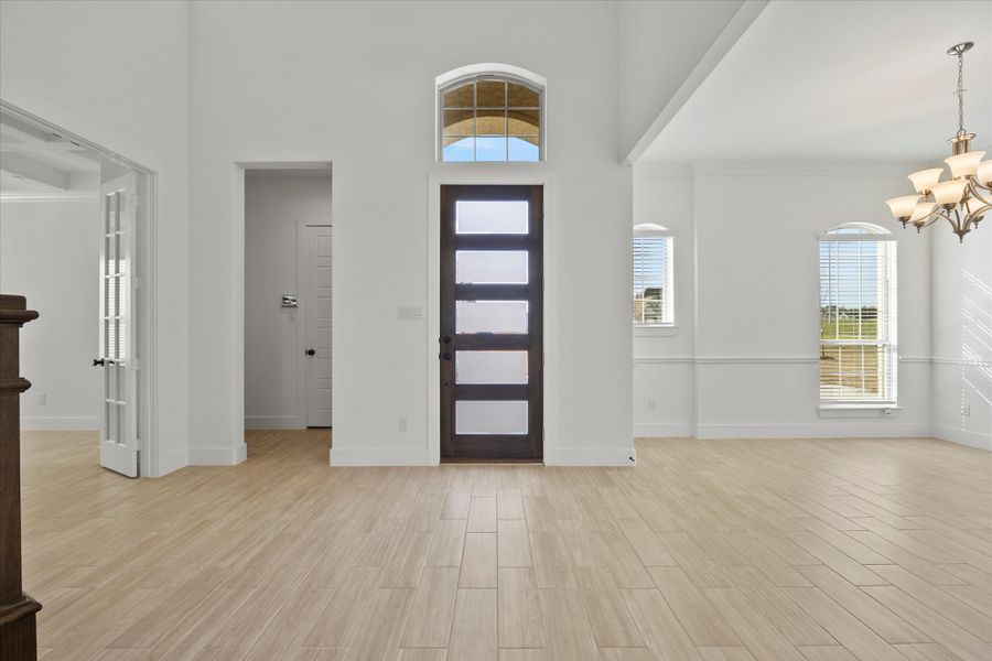 Representative unfurnished interior of a home built from the Davenport by Windsor Homes in Winding Creek, Rockwall (Image 18).