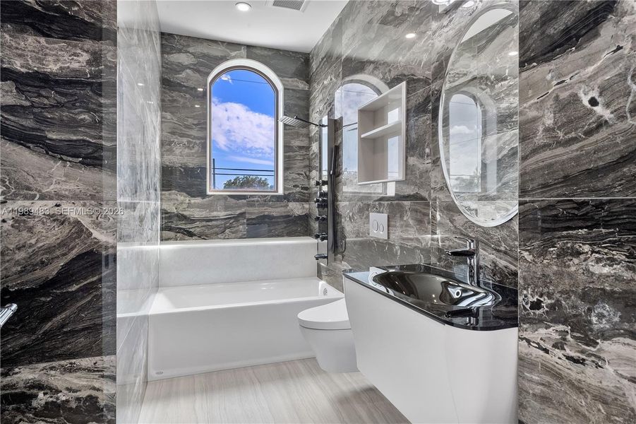 Furnished interior view inside a new home in , Surfside (Image 7).