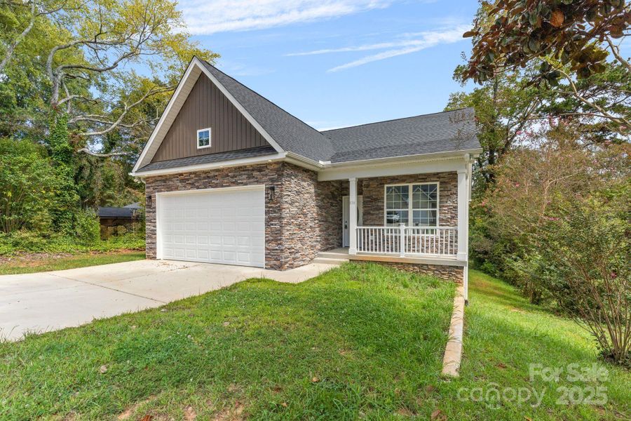 Front exterior of a new home in , Mocksville, NC, highlighting curb appeal (Image 21).
