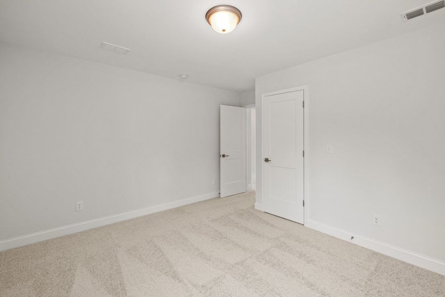 Representative unfurnished interior of a home built from the Charlton by UnionMain Homes in Austin Springs, Bethlehem (Image 20).