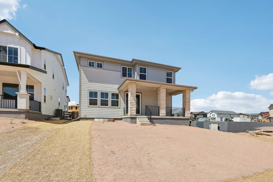 Exterior details and patio area of a home in Sterling Ranch Ascent Village, Littleton (Image 3).