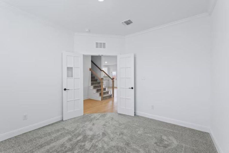 Photo of Pulte model home with same floor plan, not of actual home listed.