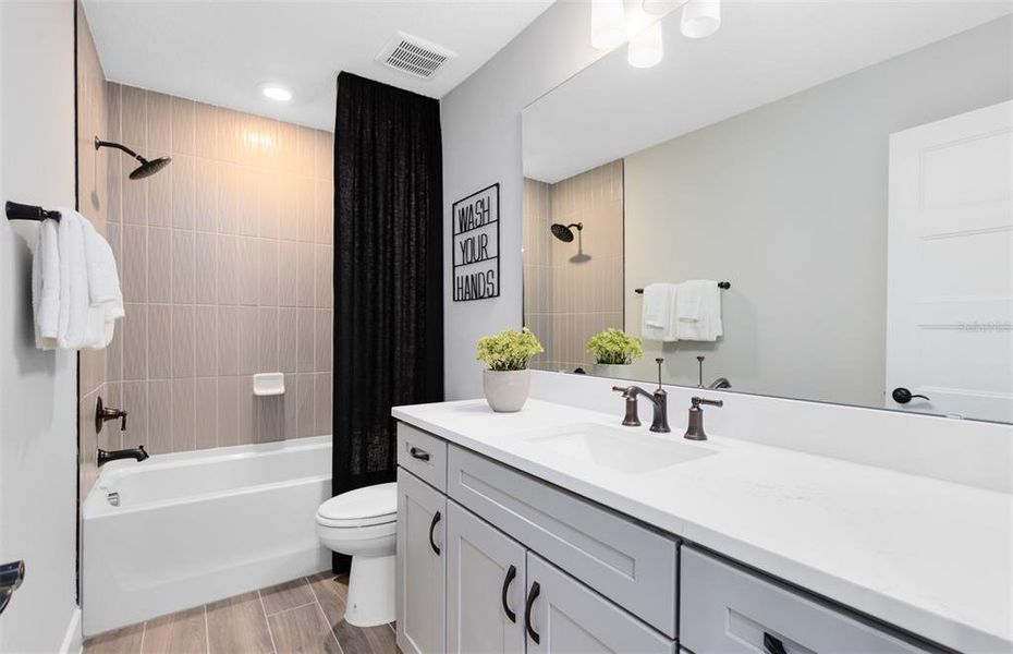 Furnished interior view inside a new home in Parkside Trails, Clermont (Image 10).