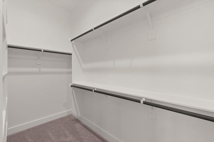 Representative unfurnished interior of a home built from the St Andrews by Chesmar Homes in Riceland Alley Loads, Mont Belvieu (Image 57).