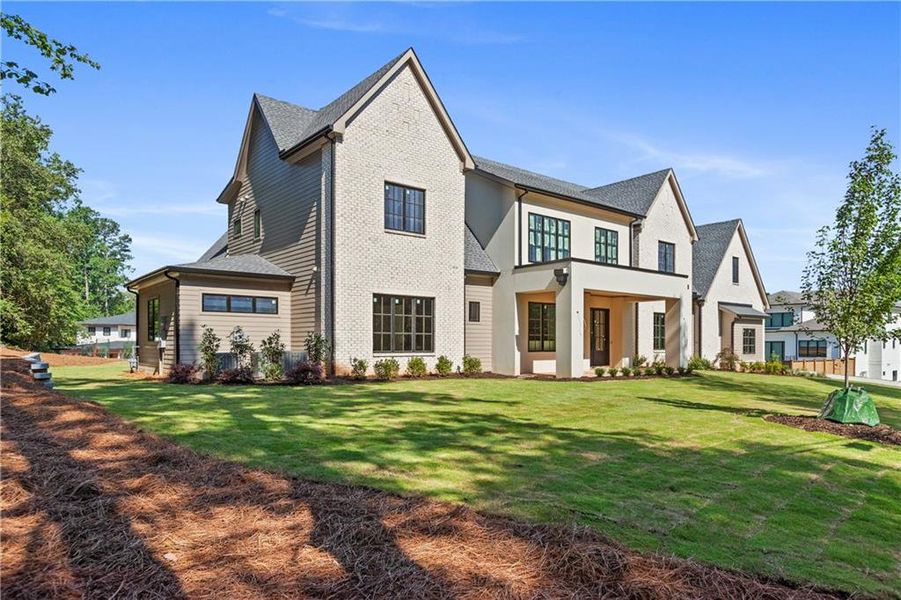 Front exterior of a new home in , Suwanee, GA, highlighting curb appeal (Image 27). Front exterior of a new home in , Suwanee, GA, highlighting curb appeal (Image 27).