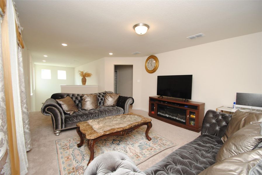 Furnished interior view inside a new home in Mason Woods, Cypress (Image 9).
