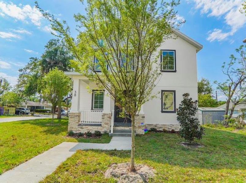 Front exterior of a new home in , Oakland, FL, highlighting curb appeal (Image 25).