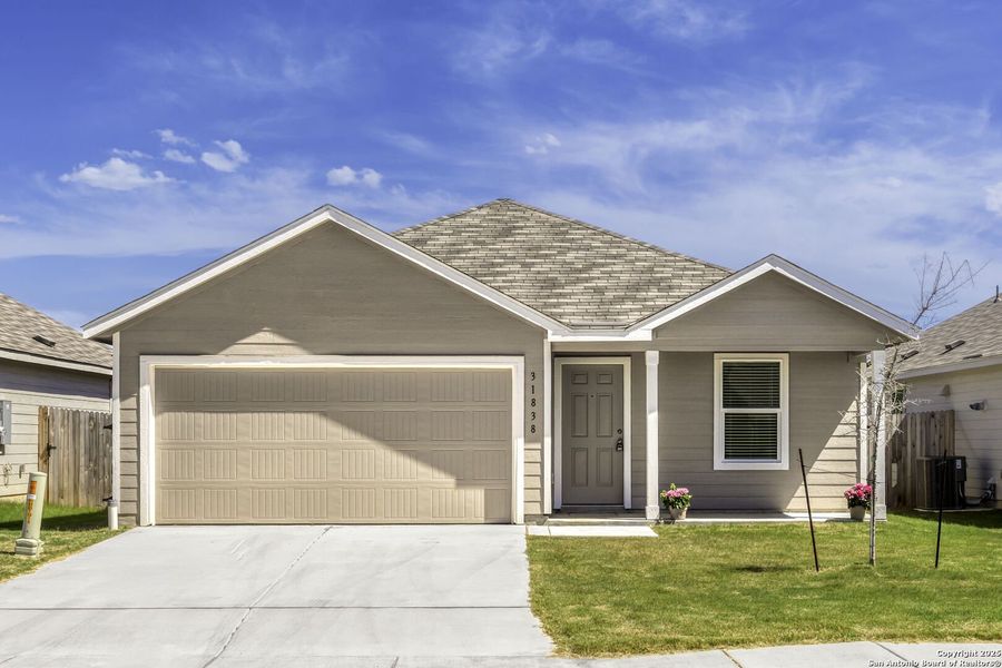 Front exterior of a new home in , Bulverde, TX, highlighting curb appeal (Image 16).