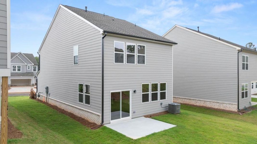 Exterior details and patio area of a home in Timber Ridge: Timber Ridge 42', Douglasville (Image 19).