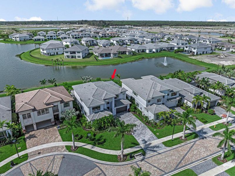 Front exterior of a new home in Apex at Avenir, Palm Beach Gardens, FL, highlighting curb appeal (Image 29).