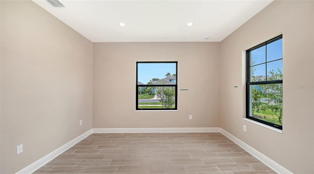 Spacious, unfurnished interior of a new home in Grand Park, Sarasota (Image 37). Spacious, unfurnished interior of a new home in Grand Park, Sarasota (Image 37).