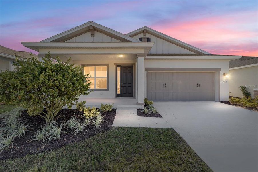 Front exterior of a new home in Calesa Township, Ocala, FL, highlighting curb appeal (Image 1).