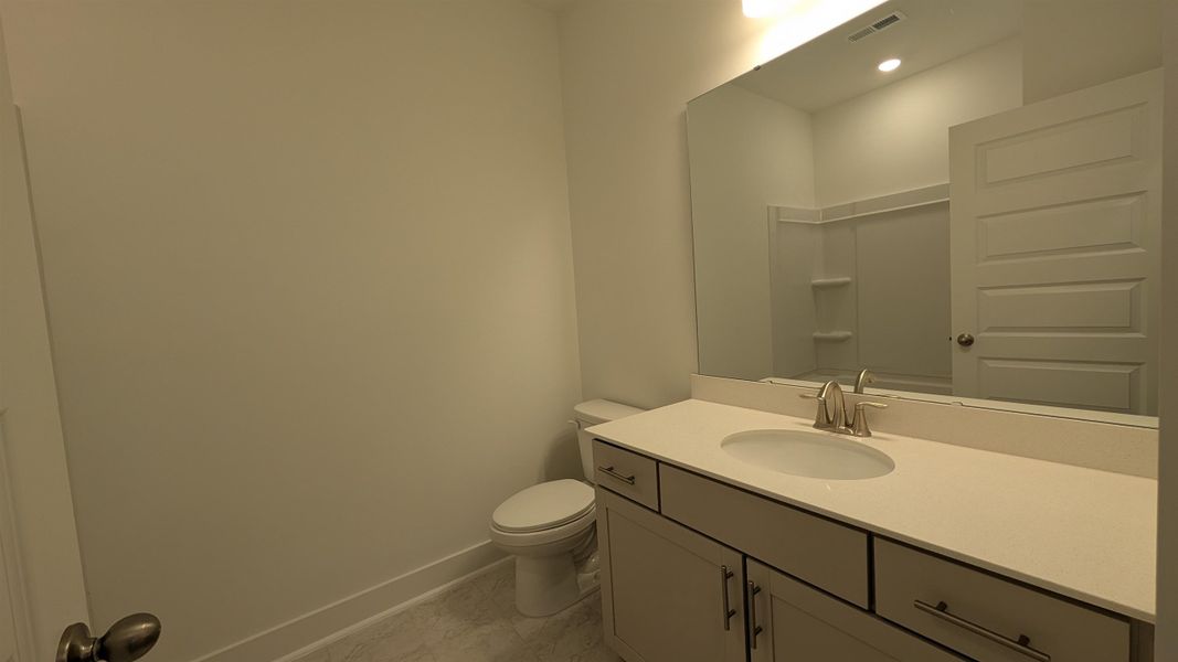 Furnished interior view inside a new home in Long Bay Golf Club, Longs (Image 28).