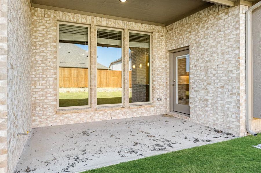 Exterior details and patio area of a home in Sonoma Verde, McLendon-Chisholm (Image 3).