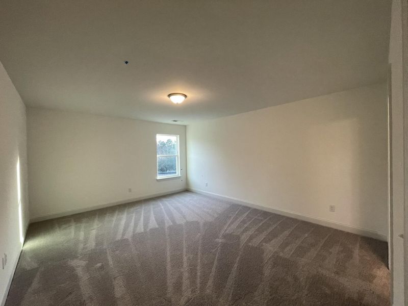 Spacious, unfurnished interior of a new home in Hillcrest Grove, Wendell (Image 21).