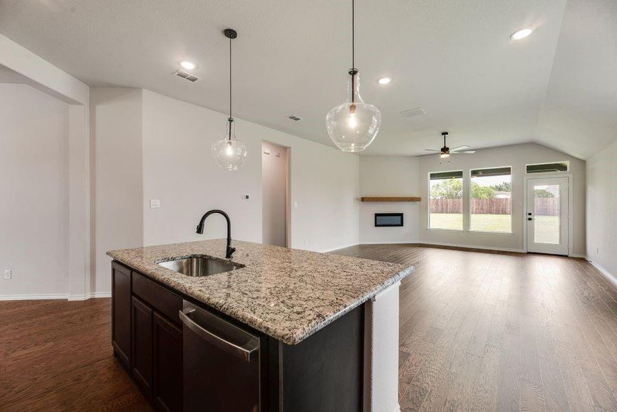 El Dorado-Concept 1937-LD-S-284 Coronado Court-Kitchen and Family Room-Risewell Homes