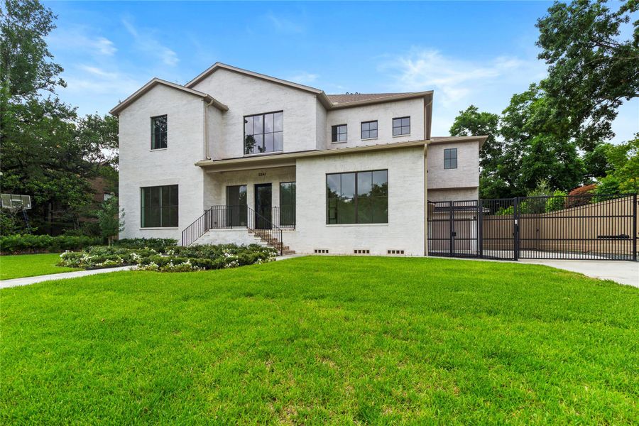 Welcome to 2341 Maroneal...true 6 bedroom, 6 1/2 bathroom brick home loaded with upgrades