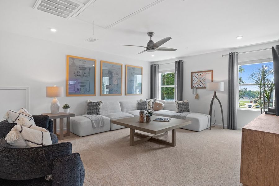 A living room with a large window.