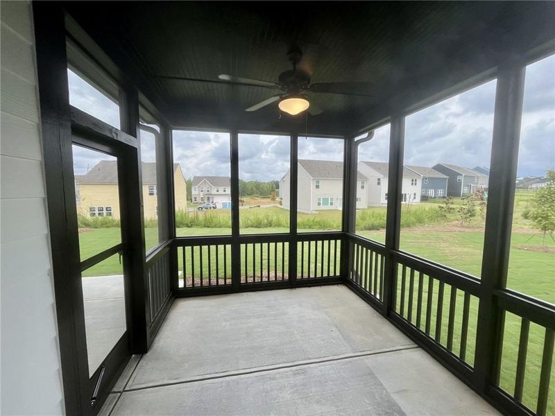 Exterior details and patio area of a home in Twin Lakes, Hoschton (Image 3).