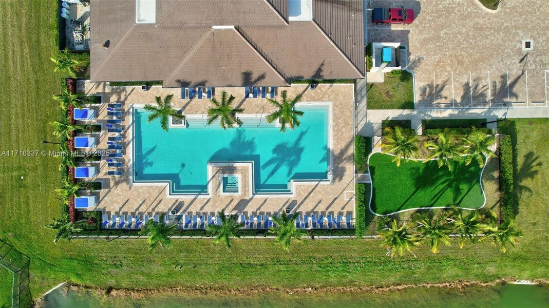 Heated lap pool at the clubhouse with beautiful lake views.