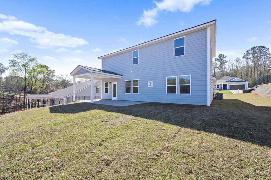 Exterior details and patio area of a home in Carriage Estates, Lexington (Image 4).
