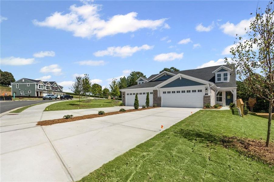 Front exterior of a new home in Villas at Gold Creek, Dawsonville, GA, highlighting curb appeal (Image 19).