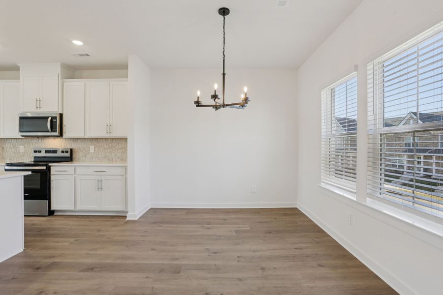 Spacious, unfurnished interior of a new home in Greystone - Highland Townhomes, Smyrna (Image 10).