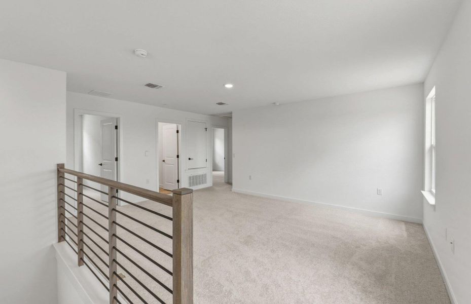 Spacious, unfurnished interior of a new home in Cameron Place, Manor (Image 23).