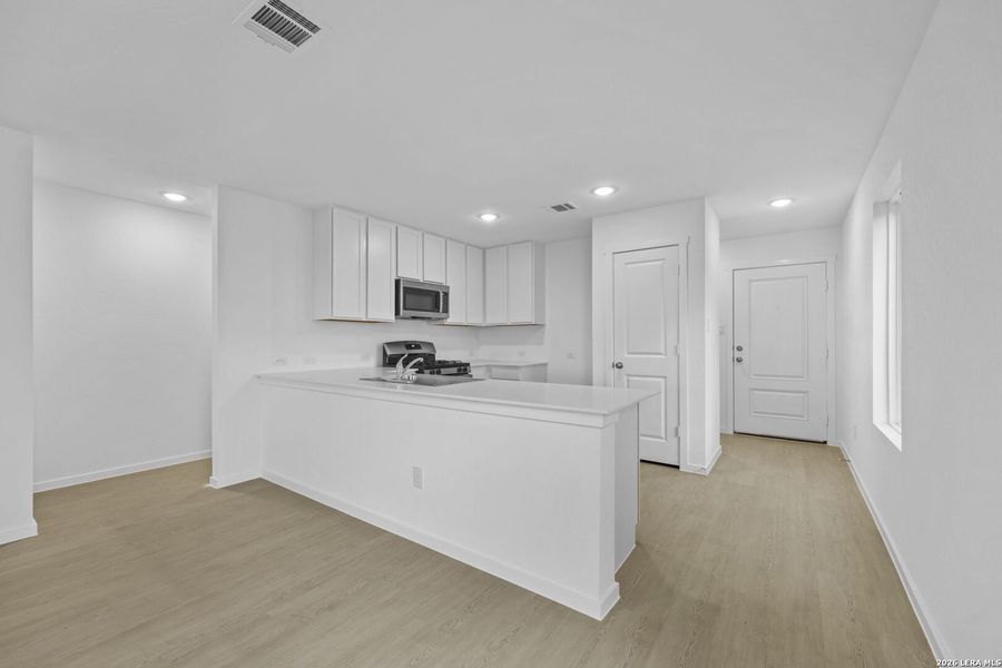 Furnished interior view inside a new home in Waterwheel, San Antonio (Image 4).