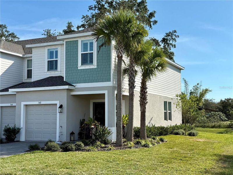 Front exterior of a new home in , Edgewater, FL, highlighting curb appeal (Image 2). Front exterior of a new home in , Edgewater, FL, highlighting curb appeal (Image 2).