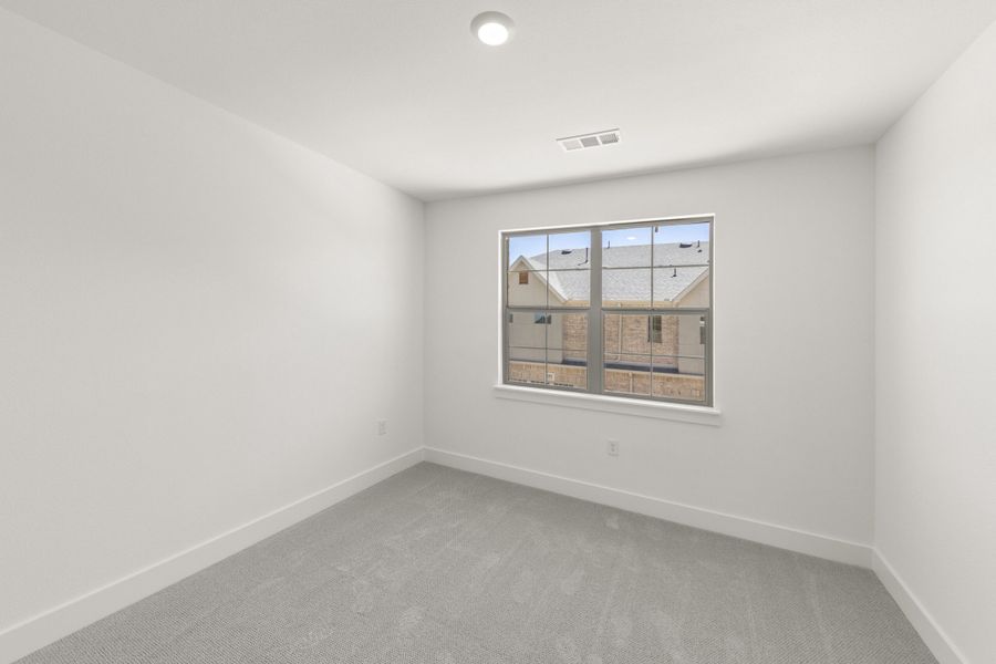 Spacious, unfurnished interior of a new home in The Tribute, The Colony (Image 21). Spacious, unfurnished interior of a new home in The Tribute, The Colony (Image 21).