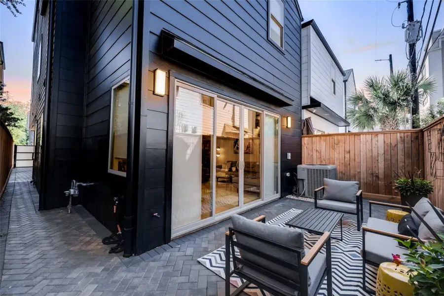 Exterior details and patio area of a home in , Houston (Image 3).