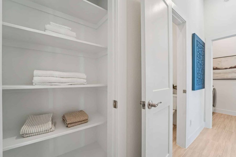 Furnished interior view inside a new home in Bridgeland, Cypress (Image 26).