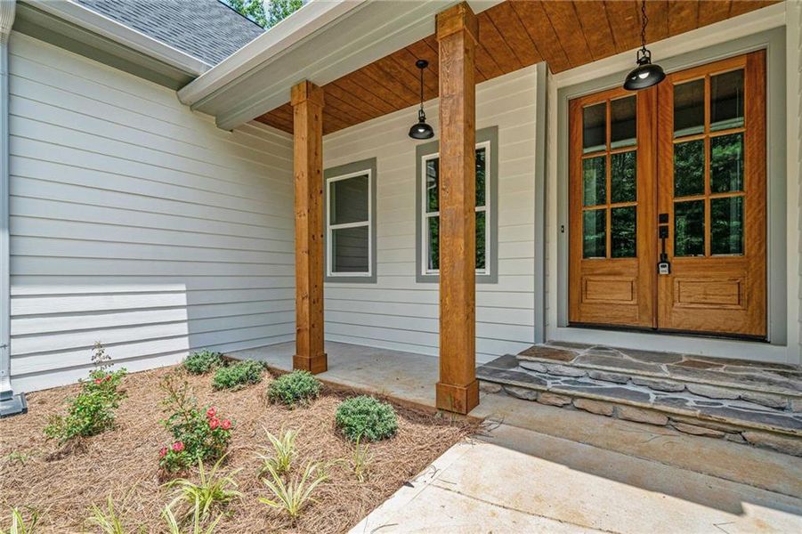 Front exterior of a new home in , Canton, GA, highlighting curb appeal (Image 1).