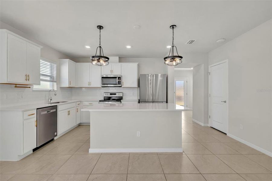 Furnished interior view inside a new home in , Kissimmee (Image 17).
